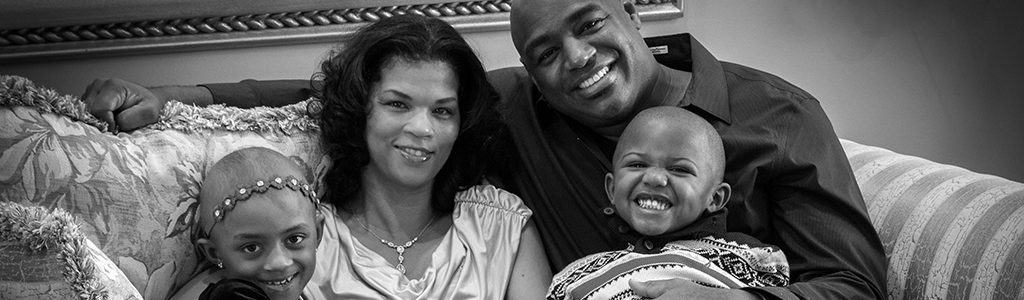 Image of a Family: Mom, Dad and Two Daughters with Bald Heads